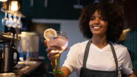 bartender serving vodka cocktails